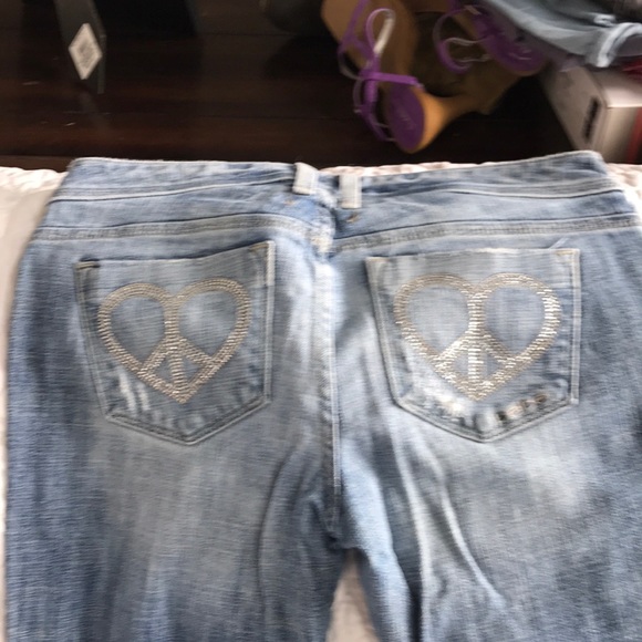 Bebe premium denim flared bottoms with rips. - Picture 4 of 4